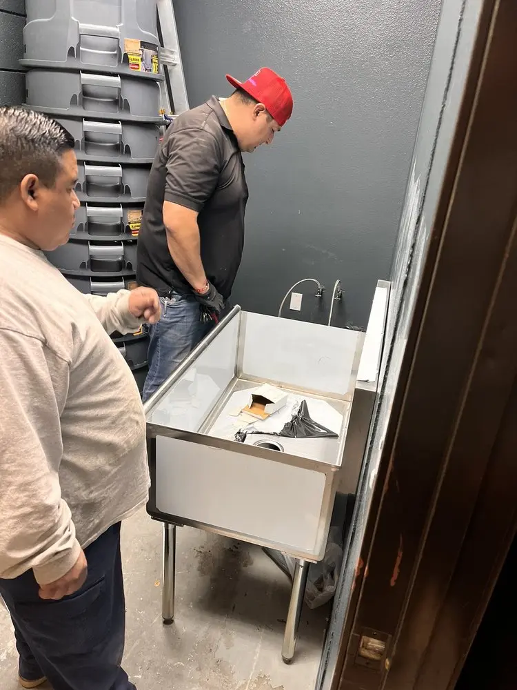 Commercial plumbing and sink installation in Sealy